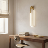 Rovan wall lamp above a walnut desk